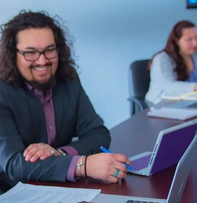 Faculty working with students