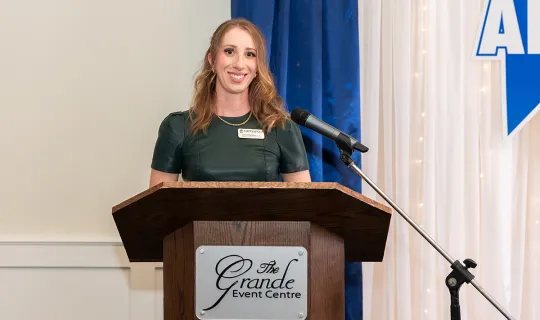Laurel Muldoon, President  Nipissing University Alumni Advisory Board delivers address 