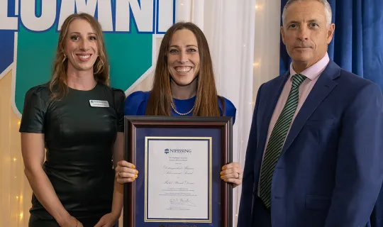 Mabel Plourde-Doran receives the Distinguished Alumni Achievement Award