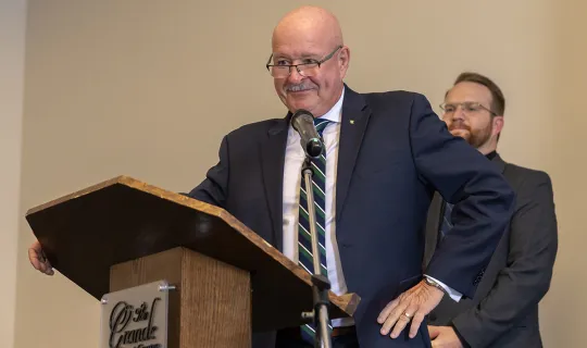Dr. Paul Cook accepts award