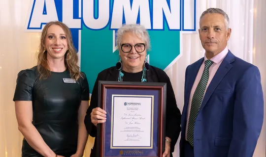 Dr. Joyce Helmer receives the Dr. James Jamieson Influential Alumni Award