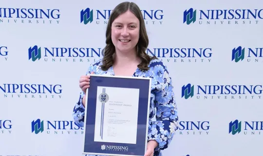 Emily Dawson with award