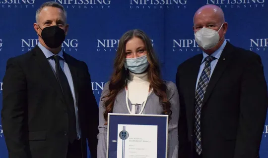 Hannah Turcotte with President and Chancellor