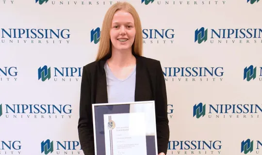 Julianna Vieveen with award