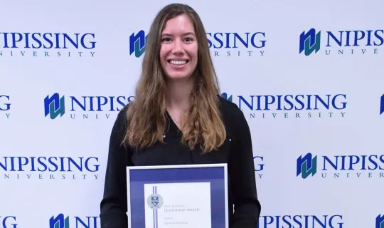 Katelyn Heppner with award