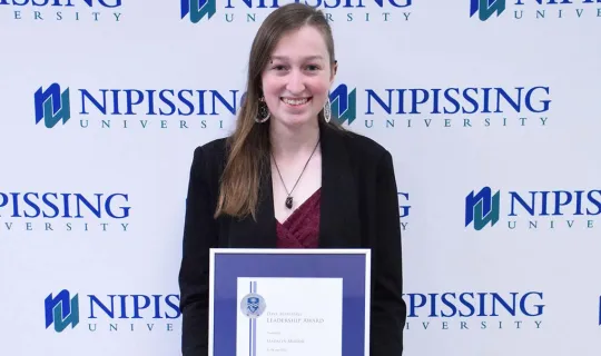 Madalyn Murray with award