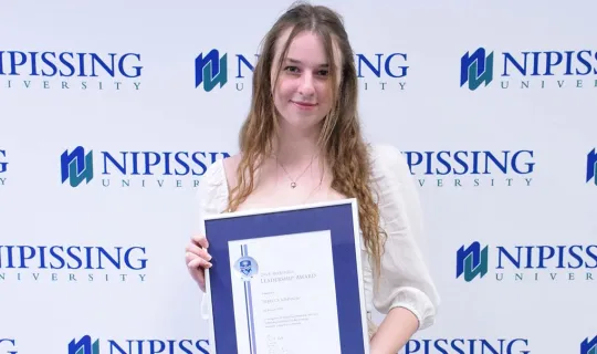 Rebecca Johnson with award