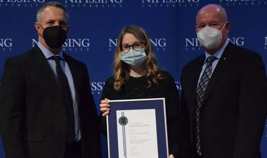 Sarah Pecoskie-Schweir with President and Chancellor