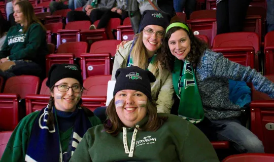Students watching Lakers hockey in Memorial Gardens at Homecoming