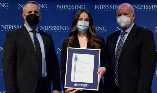 Christina Reid with President and Chancellor