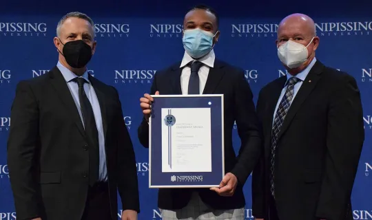 Tyrell Chambers with President and Chancellor