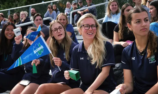 Student and alumni fans cheering on the Lakers during Homecoming weekend