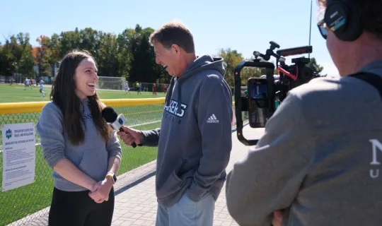 Scott Russell is taking an interview during NU Homecoming 2025