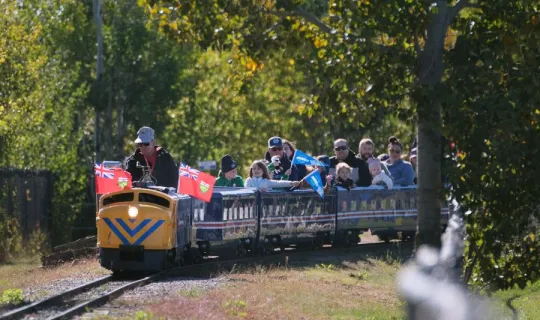 Families riding Heritage train during NU Homecoming 2025