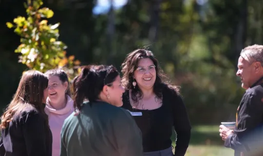 Lakers socializing outside during NU Homecoming 2025 Medicine Walk