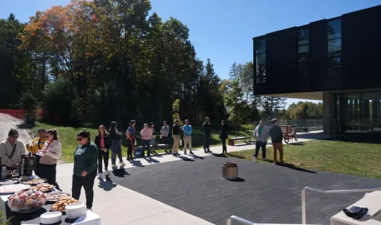 Lakers socializing outside during NU Homecoming 2025 Medicine Walk