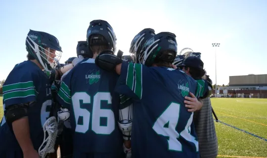 Lakers Lacrosse team is strategizing during NU Homecoming 2025