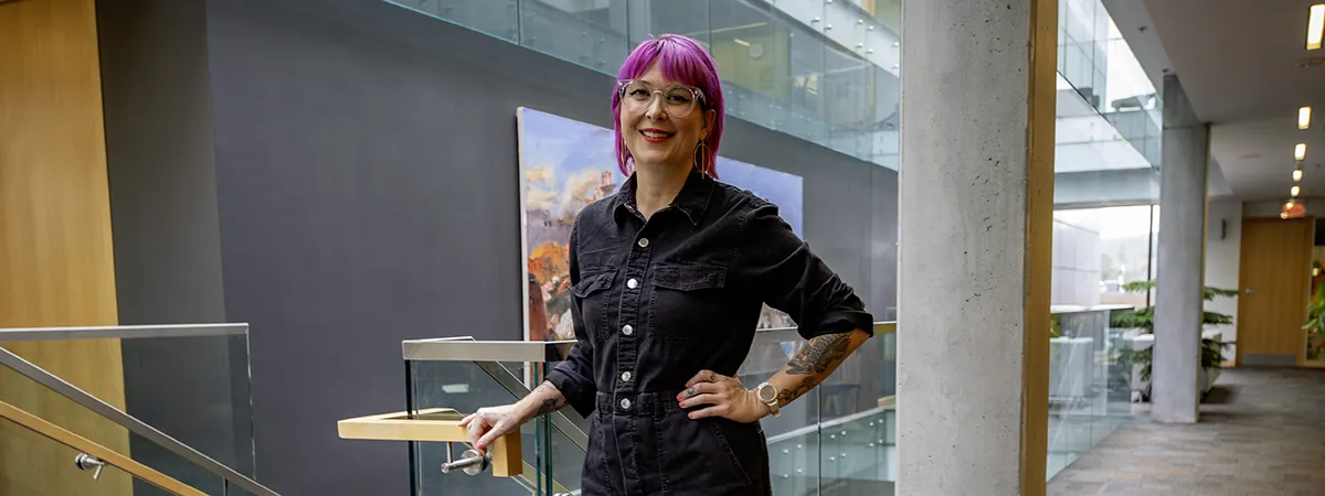 Lindsay Sullivan stands in the university library