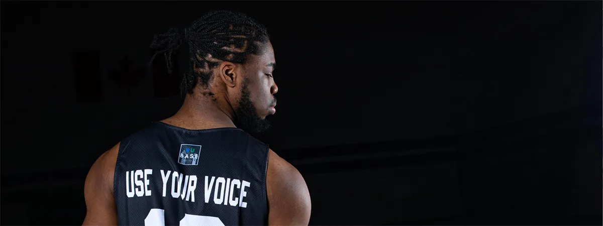 Taijon Eccleston-Graham wearing his "Use your voice" Shoot for Change jersey.