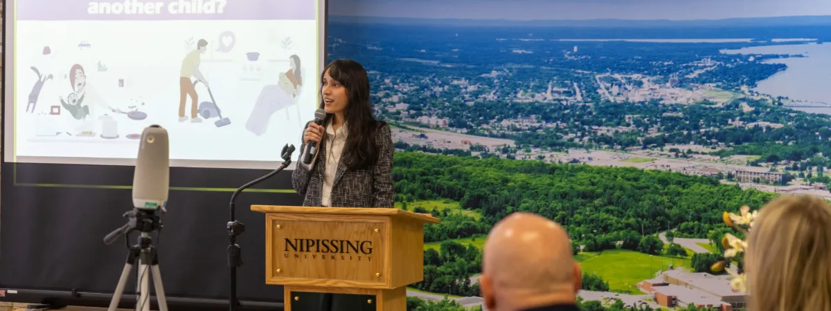 Ananya Singh presenting at 3MT