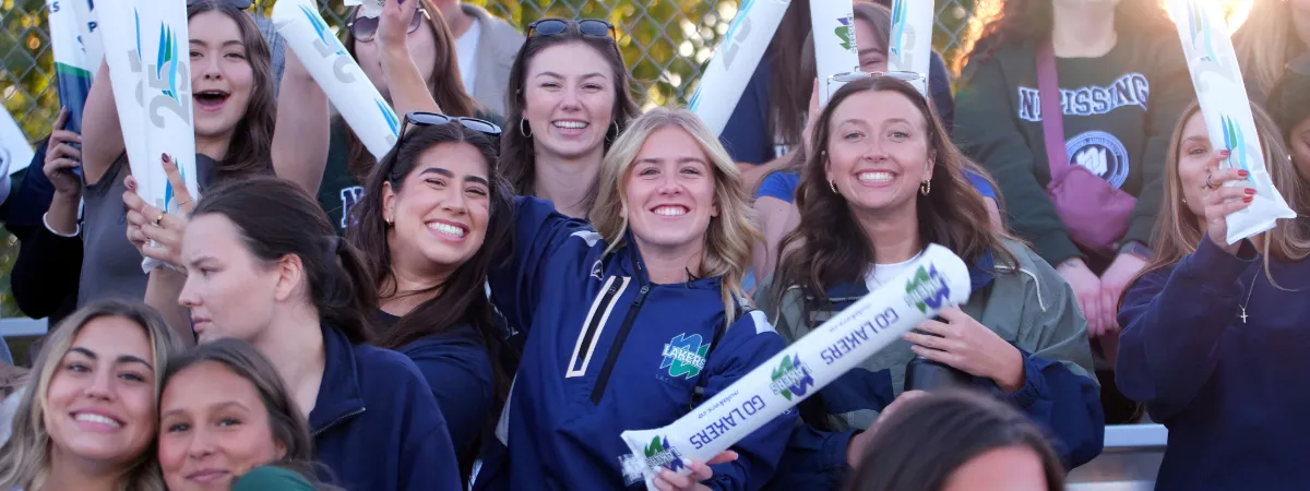 Fans cheering on the Nipissing Lakers at Homecoming 2025